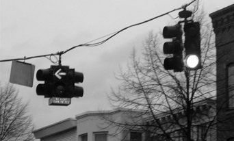 Greyscale photo of traffic lights